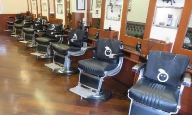 The chairs and mirrors at Headhunters